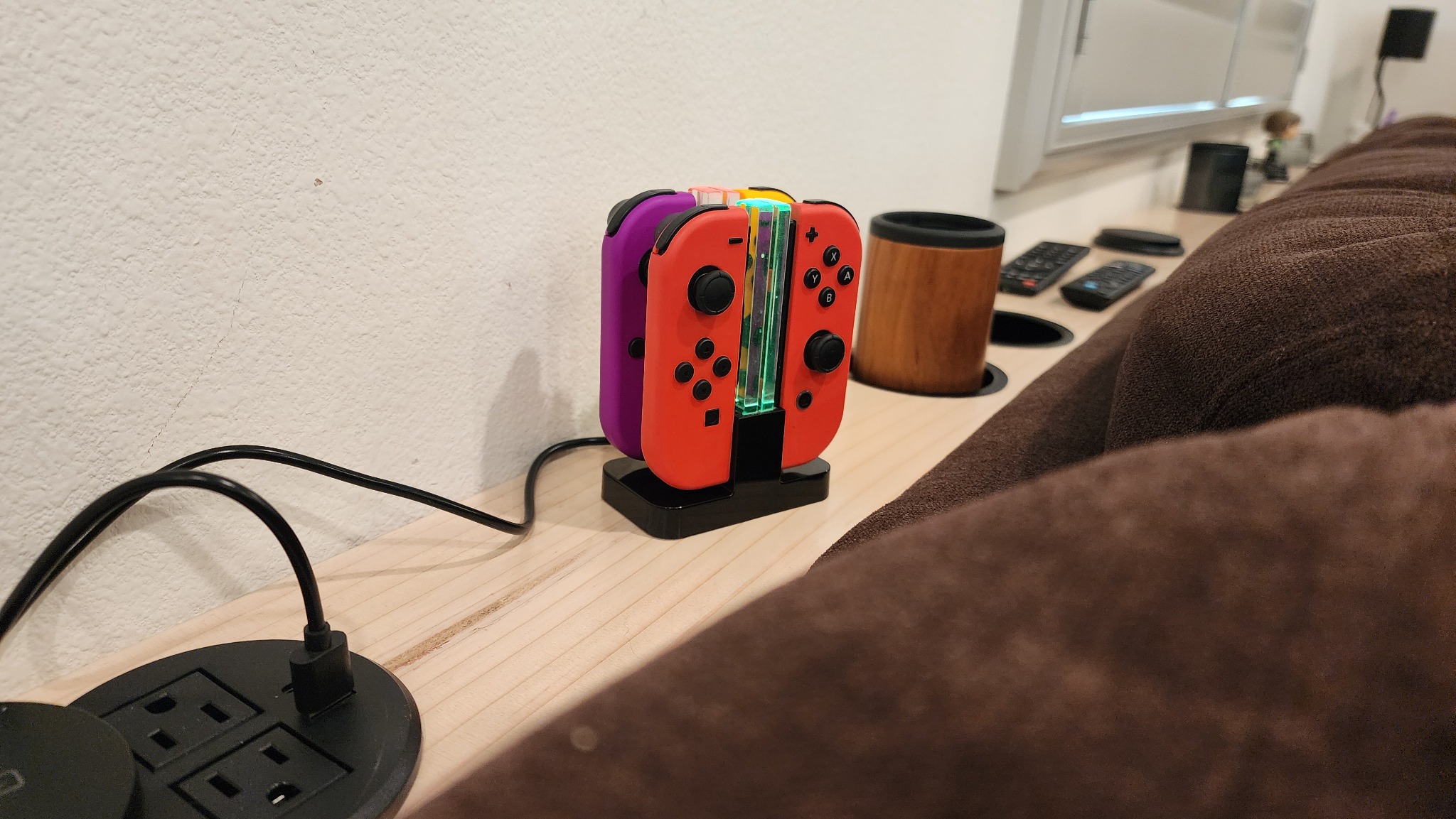 Custom entertainment console with charging and controller storage