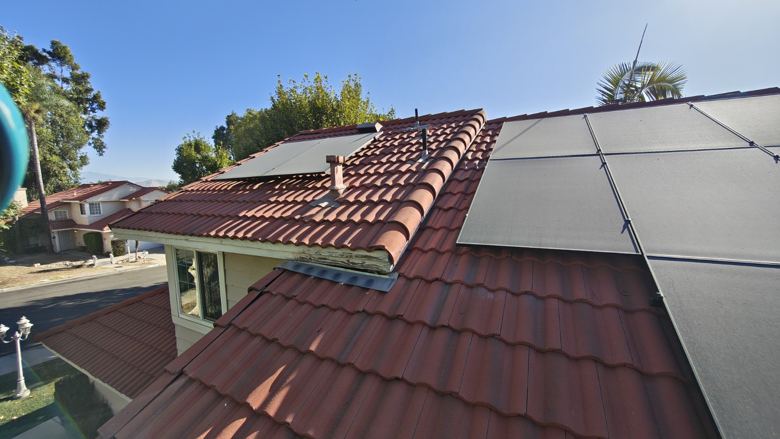 Dust and buildup visible on solar panels before cleaning