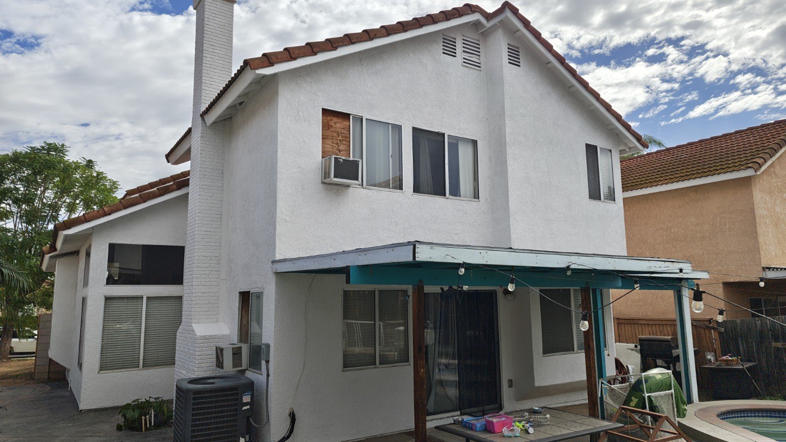 Freshly painted home exterior with contrasting trim — view 1