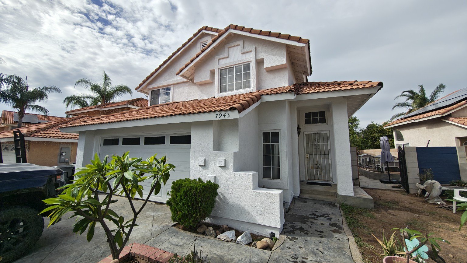 Freshly painted home exterior with contrasting trim — view 2