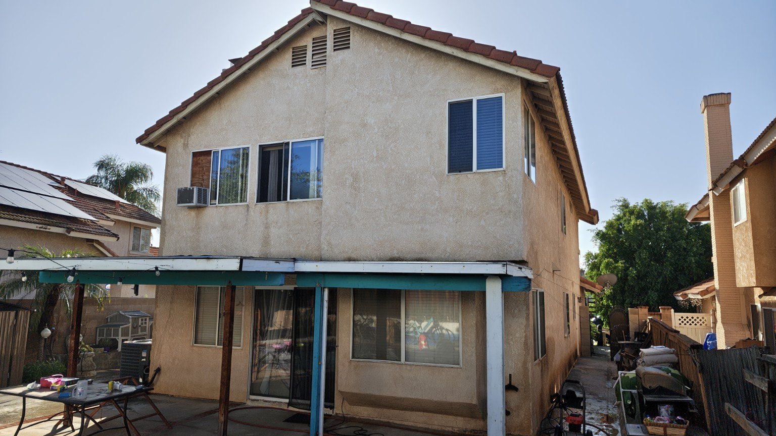 Weathered exterior before painting — view 1