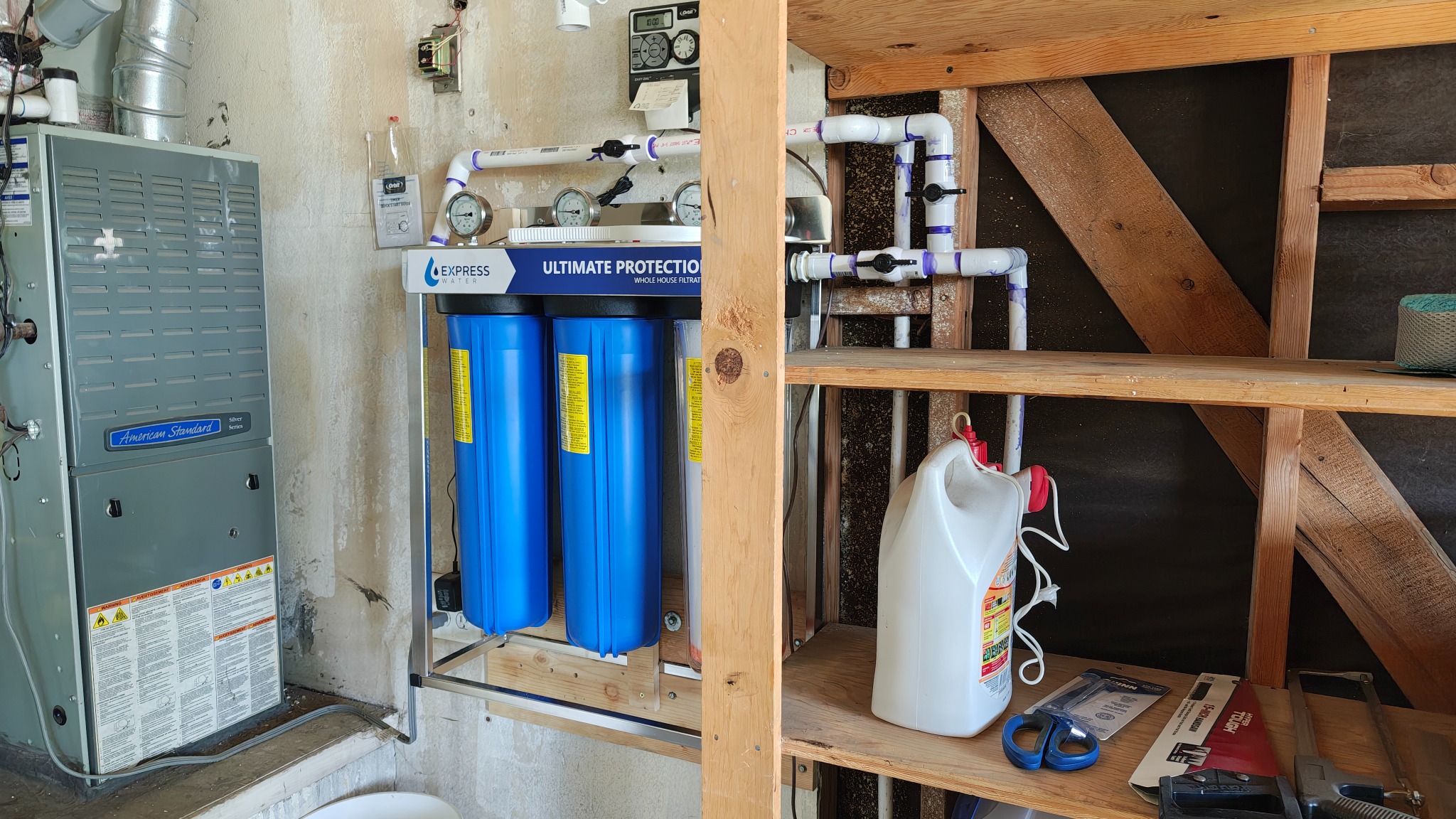 Completed whole-home water filtration system with custom plumbing